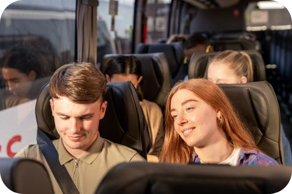 People relaxing on coach